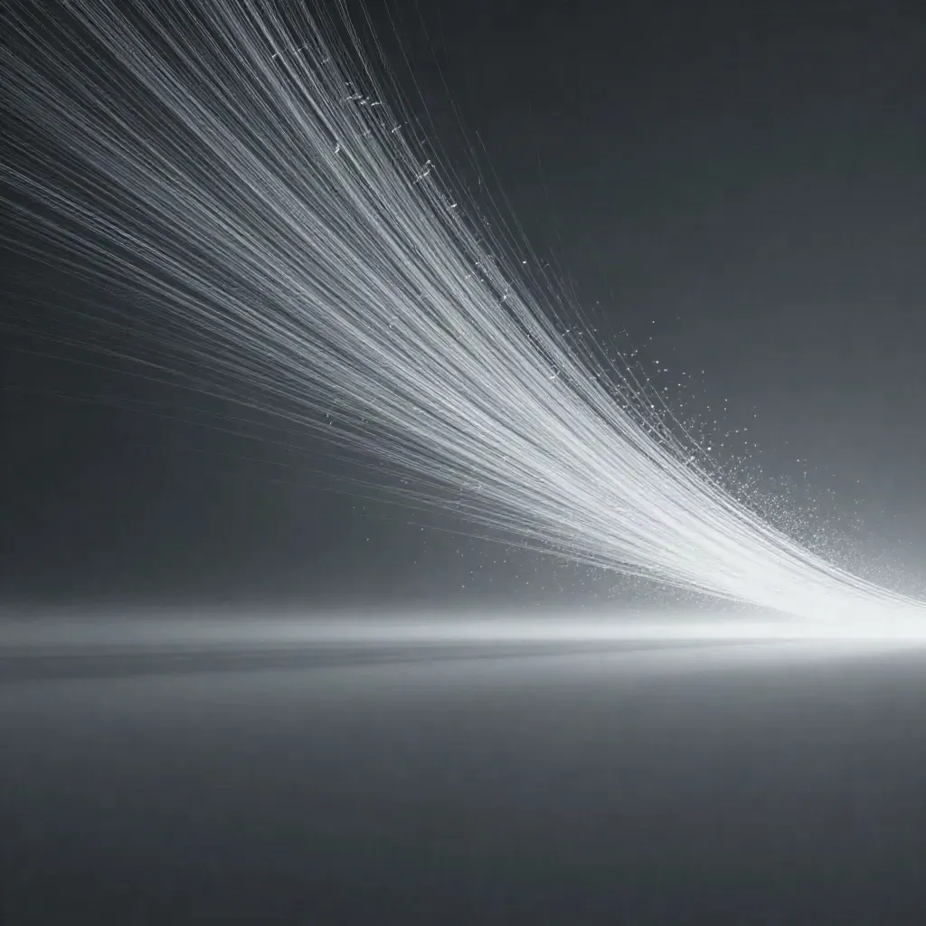 Abstract silver light filaments converge into a soft bloom in dark graphite haze.